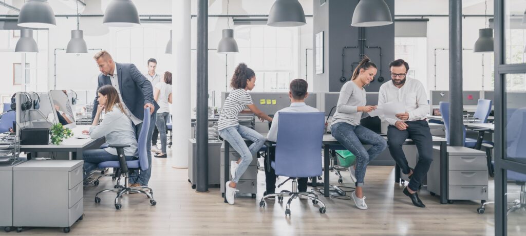 Professionals working in modern office using WiFi